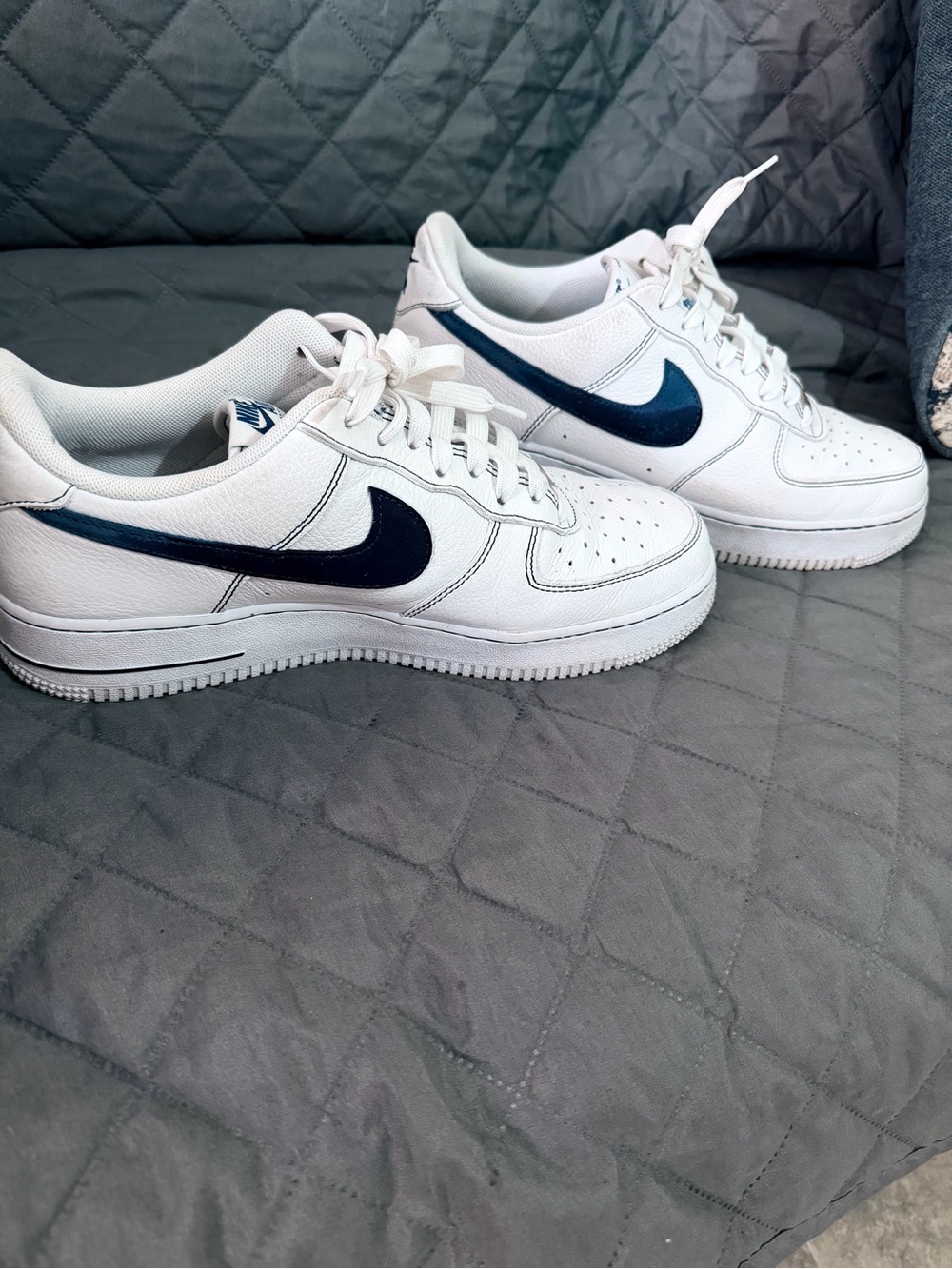 Nike Men’s White Leather Sneakers with Navy Swoosh Accent